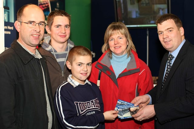Richard Moore, right, John Thompson and Son's, with Leslie, Iain, Bryan and Beverley Fleming from Omagh on the Thompsons stand at the RUAS Winter Fair.