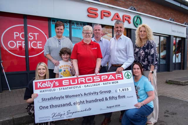 The team at SPAR Strathfoyle recently presented the cheque to Strathfoyle Women’s Activity Group on behalf of Henderson Group. (L-R): Strathfoyle Women's Activity Group Centre Manager Gemma Doherty, Childcare Worker Martina Jenkins, Strathfoyle SPAR store manager Julie Cooley, Area Manager Richard Quigley, Business Development Manager Ciaran Quinn, Strathfoyle Women's Activity Group Finance Admin Coordinator Denise Goodwin and Childcare Worker, Lisa Taylor.