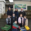 Launching the 2024 ‘supporting local produce in NI’ schools’ competition at Straidbilly Primary School, County Antrim is Joe McDonald, Head of Corporate Affairs Asda NI, Mrs Clark, teacher and BOIOFW farm host, William Irvine, UFU deputy president and BOIOFW chairman, and Straidbilly Primary School pupils.