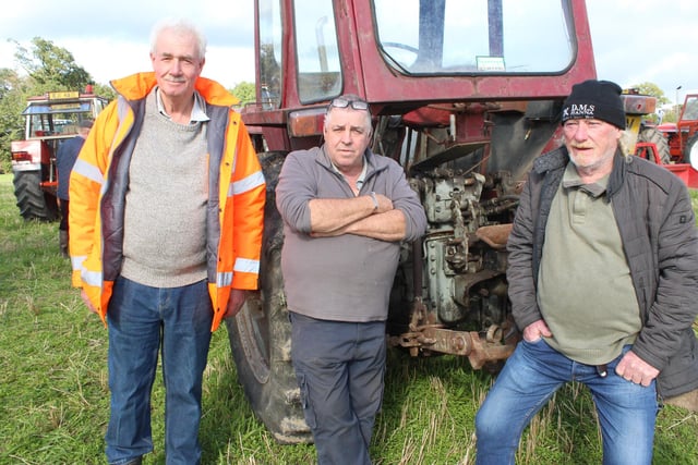 Having some craic at the threshing day at Scarva, from left, Richard Newell, Gerald Rooney and Seamus Hanna.