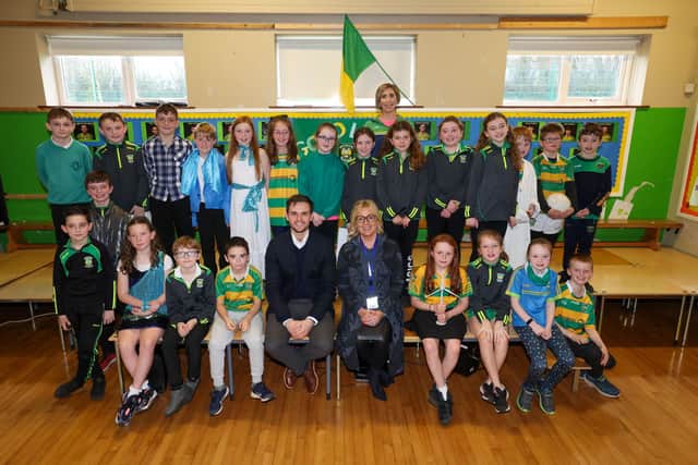 Children from St Patrick’s and St Joseph‘s Primary School, with class teacher Mrs Catherine Ball (back row), Pauline Davison, ABO Wind's educational and community outreach teacher and Michael Mullan, development project manager at ABO Wind (front row)