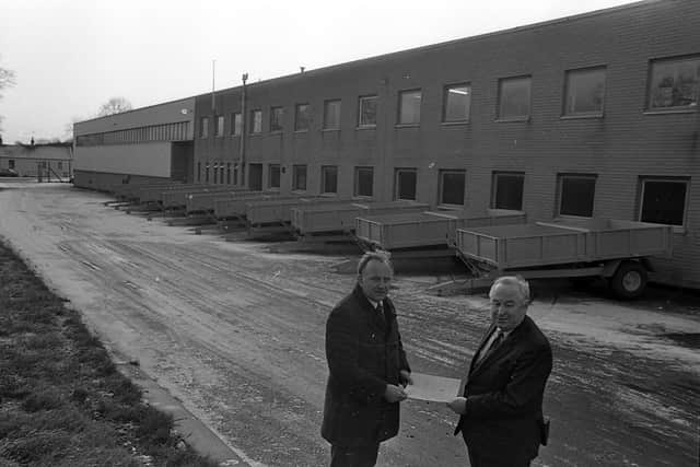 Charles Taylor, left, David Brown Tractors, taking delivery of a consignment of Weston Trailers in January 1983 from E J McBrien, managing director of Weston Engineering Ltd, Woodburn, Carrickfergus. Picture: Farming Life/News Letter archives