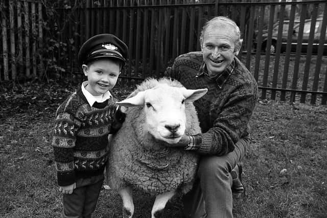 To mark the Royal Mail’s issue of Wintertime stamps and to help youngsters become more country-wise, Dundonald farmer James Watson brought one of his prize sheep to the Chichester Library on the Antrim Road in January 1992. Proud ‘postie’ is Robert McElhone from Brefne Nursery School, Belfast. Picture: News Letter archives
