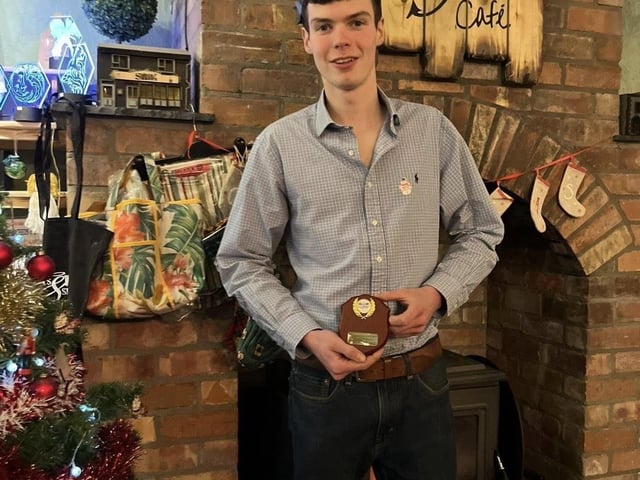 Andrew Molyneaux with his award at Donaghadee YFC's recent annual Christmas awards dinner at Saints N’ Sinners in the seaside town.