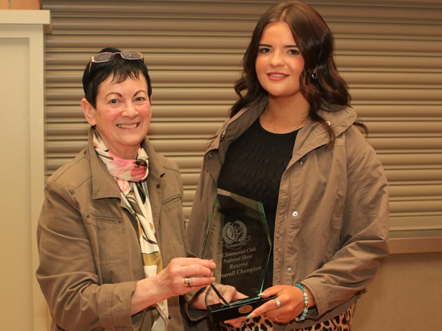 Ruth Montgomery, Clogher Valley Show secretary, presenting the reserve female champion crystal to Lexi Heatrick for Ballinalare Farm Ritz