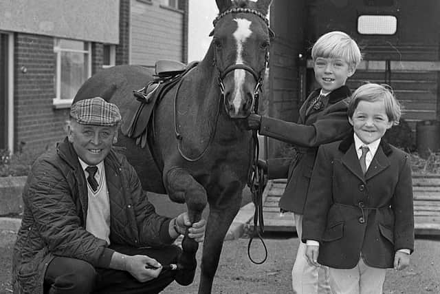 Pictured at the end of September 1992 at the Dromore Horse Fair is Kenneth Moore from Ballynahinch with his daughters Sarah and Kathryn and their pony Suzie which won the tony tots and under 8 classes at Dromore. Picture: News Letter archives/Darryl Armitage