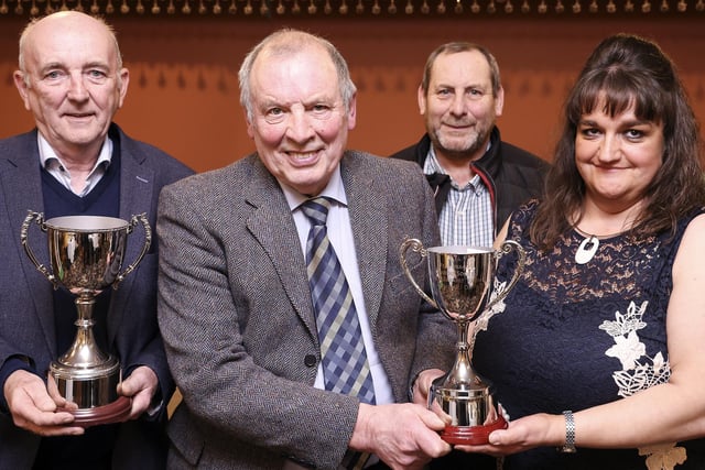 Albert Knox, (second left), Chief Steward at Fermanagh Show, present the cup for the Best Dressed Window to Helen Beatty, Chernobyl Children Appeal Charity Shop, with Trevor Kirkpatrick (second right), shop manager. Also included is Winner of The Vintage Section at Fermanagh Show Pat Kelly, (left).