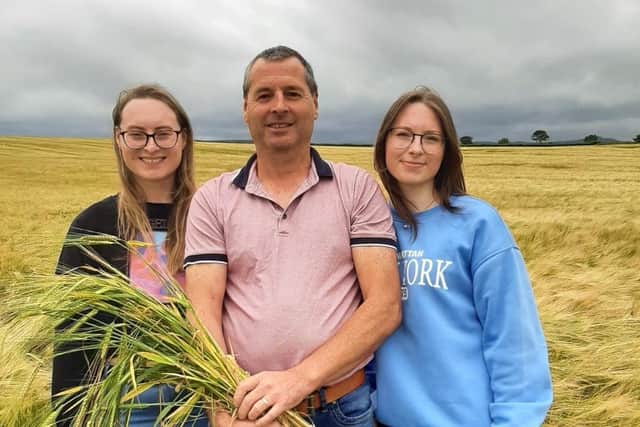 Mark McCollum pictured with his two daughters Amy and Rachel from UFU North East Derry group. Pic: UFU
