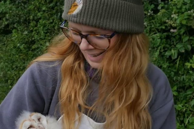 Kathy Bell, Ulster Wildlife with a barn owl chick. Pic: UTV