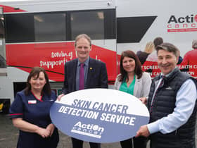 Iona McCormack, David Brown, Carol Marshall and Gareth Kirk (CEO, Action Cancer) pictured in front of the Big Bus