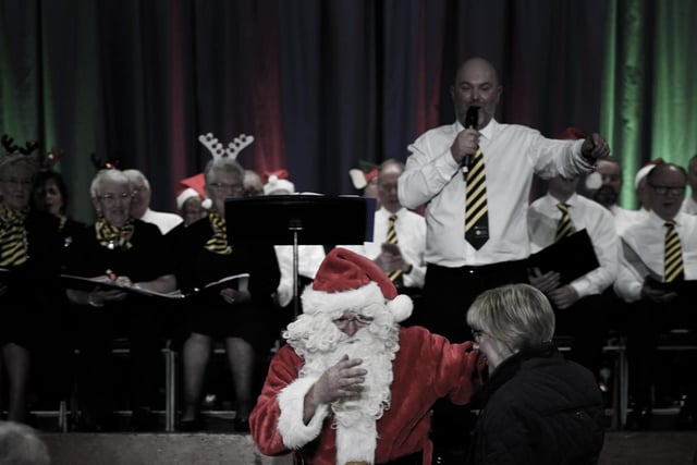 Santa got his grove on at the Farmers' Choir Christmas Concert.