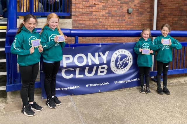 Jessica McCarroll, Caroline Wallace, Rosie Clarke and Myra McCarroll taking part in Dodson Horrell National Pony Club Quiz Final. (Pic: Seskinore Harriers PC)
