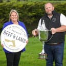 Carolyn Greene from RUAS joins Gareth Corrie from JCB Commercials, who were awarded last year’s Supreme Champion, to remind livestock exhibitors that entries for the 2023 Beef & Lamb Championships will close on Tuesday 31st October at 5pm. Pic: Brian Thompson
