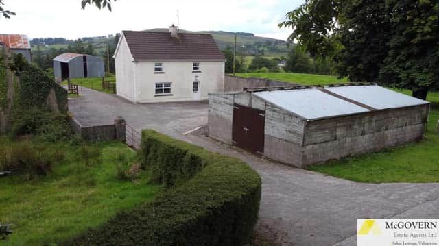 A four-bedroom farmhouse, with a range of outbuildings and agricultural land, is on the market in Northern Ireland with a guide price of £300,000. Image: www.mcgovernestateagents.com