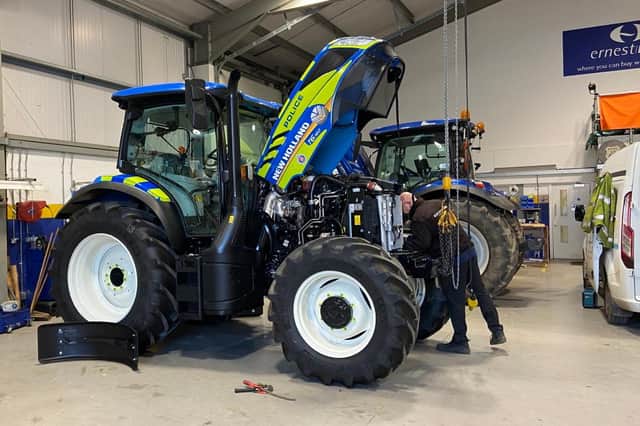 Final checks to the on-loan tractor ahead of the Doe Show next week