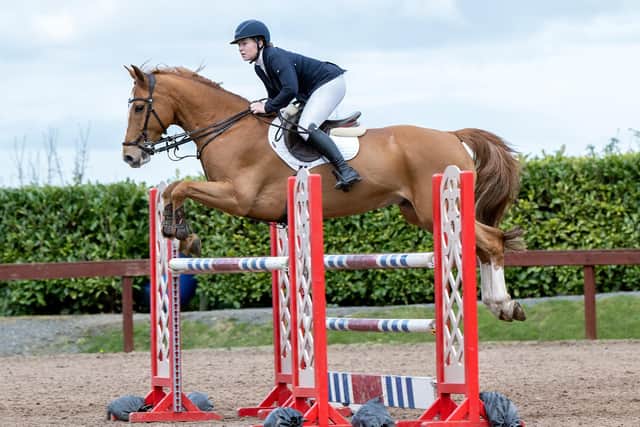 Lucy Gibson on Merlins Maytrix, winner of the 1.30m class. (Pic: Sporting Images NI)