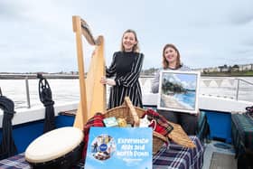 Musician Mary Kaeg and artist Jenni Robinson on the Bangor Boat are looking for to the range of Experiences on offer in Ards and North Down. (Image: Graham Baalham-Curry.)