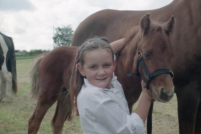 Pictured in September 1995 at the Ahoghill Pony Fair is Katherine Reid of Carnlough with her pony, Dancer. Picture: Farming Life/News Letter archives