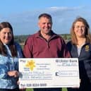 Cheque presentation to Marie Curie. (L-R) Wendy Kerr group manager, Chris Gill 2022 County Tyrone chairman and Alison Donaldson group manager.