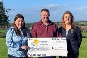 Cheque presentation to Marie Curie. (L-R) Wendy Kerr group manager, Chris Gill 2022 County Tyrone chairman and Alison Donaldson group manager.