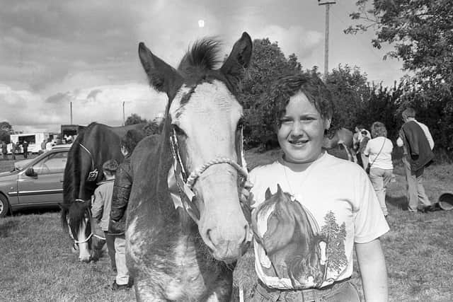 Pictured in September 1992 at the Ahoghill Horse Fair is Roberta Campbell from Ballymoney with the champion foal. The premier championship award at the fair was awarded to Robert Campbell of Ballymena for his Clydesdale mare with foal. Picture: News Letter archives/Darryl Armitage
