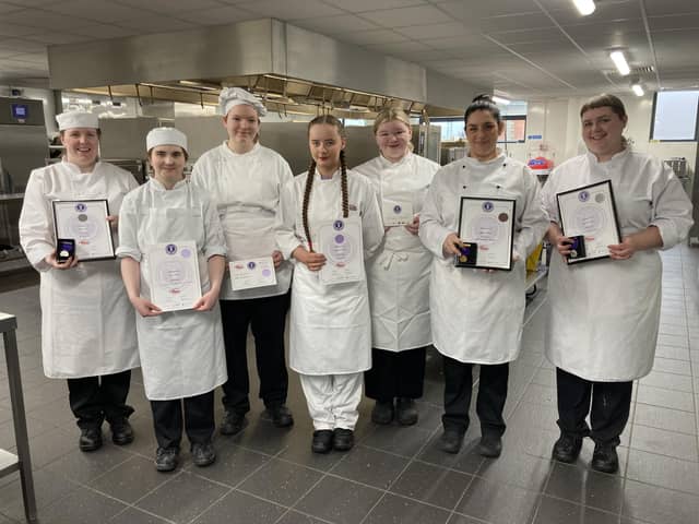 IFEX wins for SERC: (L – R) Level 2 and Level 3 Diploma in Professional Bakey students at SERC’s Lisburn Campus who picked up Awards at IFEX were Naomi Fox (Lisburn), silver for Novelty Cake Senior; Amy O’Neill (Lisburn), merit for Celebration Cake; Faye McGrogran (Lisburn), merit for Wedding Cake; Seraphina Willis (Crumlin), merit for Novelty Cake Junior; Evangeline Johnston (Banbridge) bronze, for Novelty Cake Junior; Roisin Walsh, (Belfast) bronze, for Afternoon Tea Senior and Carly Buchanan (Belfast), silver for Decorative Exhibit. Missing from photo Wilma Mavindidze, bronze for Novelty Cake Senior and Gemma Diamond, bronze for Restaurant Innovation – Dessert of the Year.