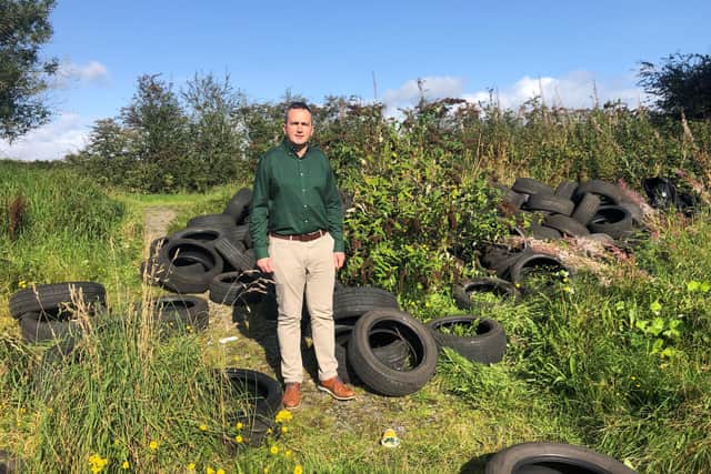 MLA Stephen Dunne at a fly-tipping site in the Craigantlet Hills, Co Down. Picture: Stephen Dunne