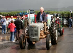 Taking his vintage tractor through the annual Steam Rally held in Ballymena Showgrounds