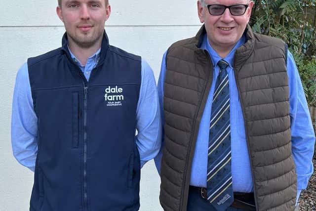 Ian Nelson, Dairy Herd Management, sponsor, outlining plans for Holstein NI’s 24th AGM, with secretary John Martin.