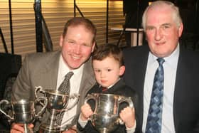 Pictured in April 20908 is Des Wright (right), who is seen presenting cups to Andrew and Thomas Nevin during the Garvagh Ploughing Society match awards dinner in the Imperial Hotel, Garvagh. Picture: Farming Life archives/Kevin McAuley