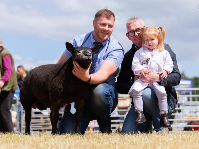 Reserve Champion was a Ram Lamb, Woodview Juggernaut, from Aly Shortt. Pictured is Aly Shortt, Kaine Holden and Darcie Holden.