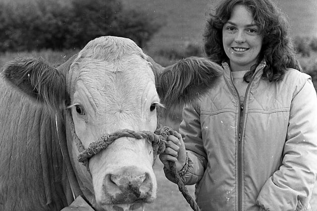 Veterinary assistant Susan Doak from Cregagh, Belfast, with Irish Manta which was owned by R A McBride of Crossgar, which won fourth place in the senior Simmental heifer class at the Saintfield Show in June 1982. Picture: Farming Life/News Letter archives