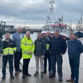 Agriculture and Rural Affairs Minister Andrew Muir is pictured on a visit to Portavogie Harbour with Chair of the Northern Ireland Fishing Harbour Authority (NIFHA) Stephen Welch, Neil Warnock Portavogie Harbour Master, NIFHA Board member Harry Wick, NIFHA Project Manager David Lindsay, NIFHA CEO Kevin Quigley, local Skipper Philip McMullan and NIFHA Board member Robert Ryans. (Pic: DAERA)