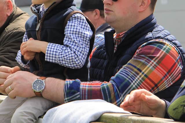 Andrew Patterson and nephew George Irwin keep an eye on the Holstein judging. PIcture: Julie Hazelton