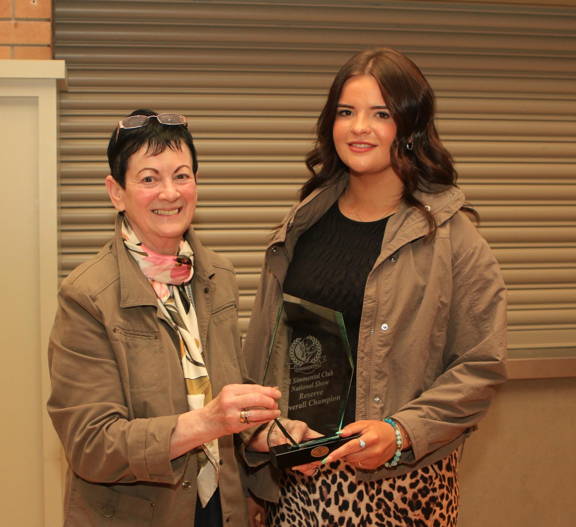 Ruth Montgomery, Clogher Valley Show secretary, presenting the reserve female champion crystal to Lexi Heatrick for Ballinalare Farm Ritz