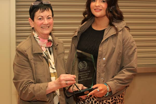 Ruth Montgomery, Clogher Valley Show secretary, presenting the reserve female champion crystal to Lexi Heatrick for Ballinalare Farm Ritz