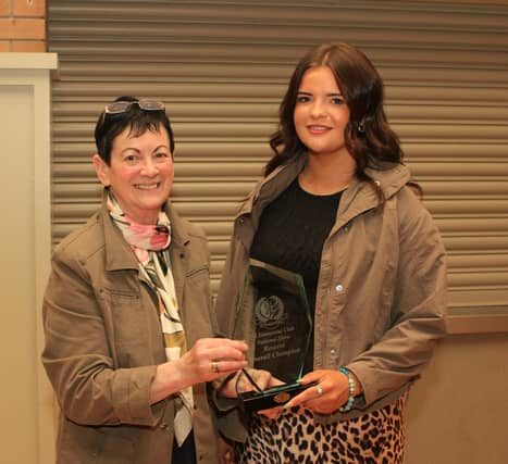 Ruth Montgomery, Clogher Valley Show secretary, presenting the reserve female champion crystal to Lexi Heatrick for Ballinalare Farm Ritz