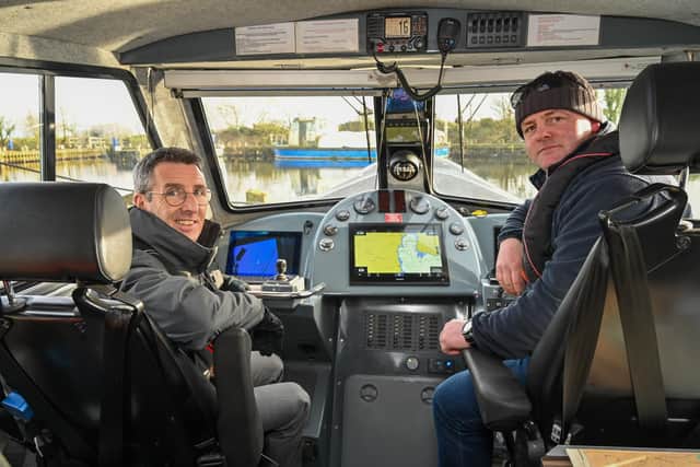 DAERA Minister Andrew Muir (left) takes a boat trip across Lough Neagh with Skipper and Fisheries Officer Eoin McFadden. (Pic: Simon Graham)