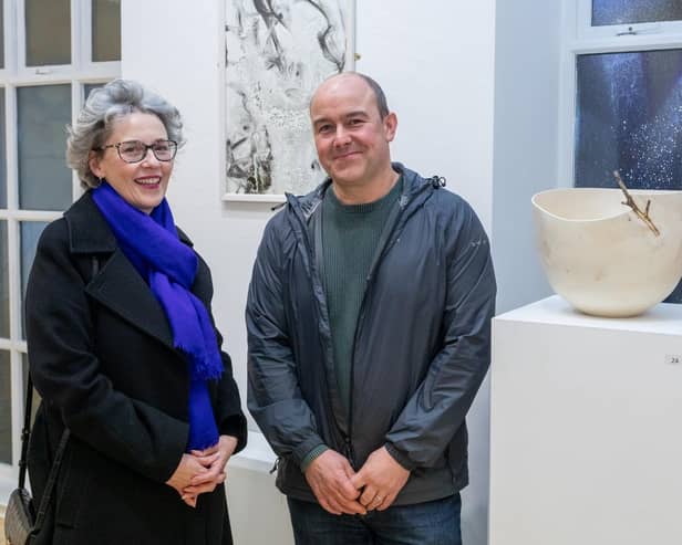 Dr Suzanne Lyle, Head of Visual Arts, Arts Council of Northern Ireland, and Artist Mark Hanvey with his sculpture.