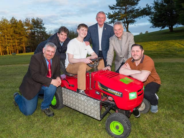 Members of Saintfield Show Committee with Father and Son team Ethan and Barry McGreevy (Members of NI Lawnmower Racing Association)
