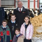 Straidbilly Primary School pupils pictured with William Irvine, UFU deputy president and BOIOFW chairman, and Joe McDonald, Head of Corporate Affairs Asda NI, launching the 2024 ‘supporting local produce in NI’ school’s competition.
