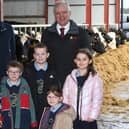 Straidbilly Primary School pupils pictured with William Irvine, UFU deputy president and BOIOFW chairman, and Joe McDonald, Head of Corporate Affairs Asda NI, launching the 2024 ‘supporting local produce in NI’ school’s competition.