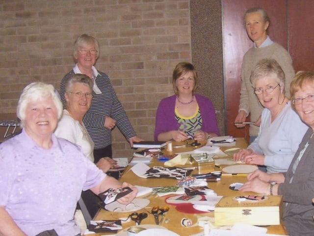 We were wondering if any of our readers might be able to identify those in the photographs.