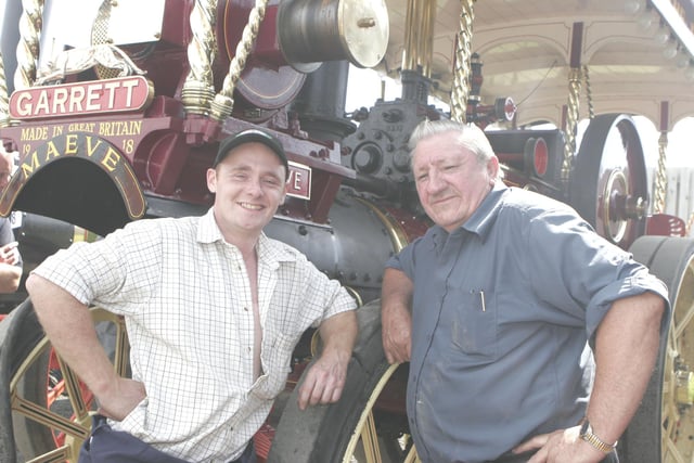 Martin Keelan and Finn Lynch enjoy a chat at the steam engine rally. Picture: Kevin McAuley