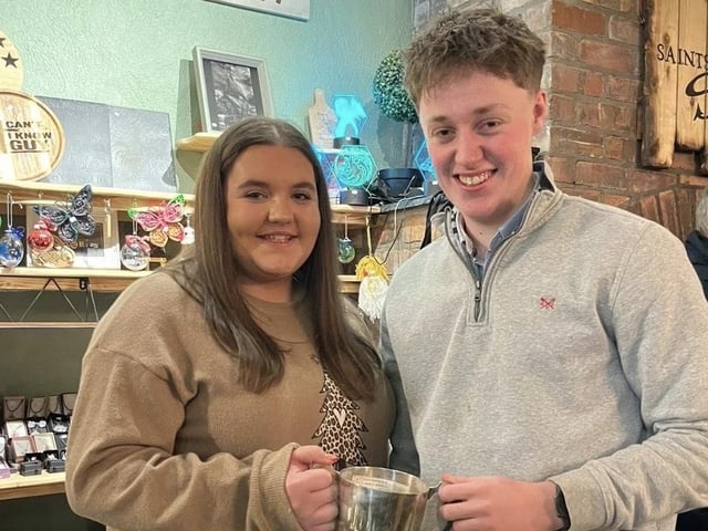 Joanna Caughey and James Steele with their award at Donaghadee YFC's recent annual Christmas awards dinner at Saints N’ Sinners in the seaside town.