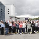 Staff from Pilgrim’s Europe Dungannon pictured outside the facility as they mark 50 years of operation, celebrating five decades of contribution to the local economy, community, and food industry.