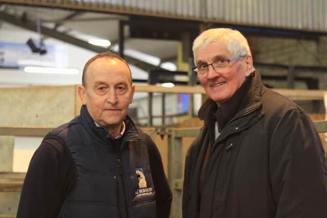 Holstein NI president David Perry, chats to December sale sponsor Ivan Minford, AI Services (NI) Ltd. Picture: Julie Hazelton