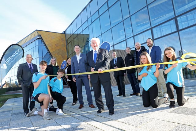 Cllr Jeff Watson cuts the ribbon to open the new leisure centre.