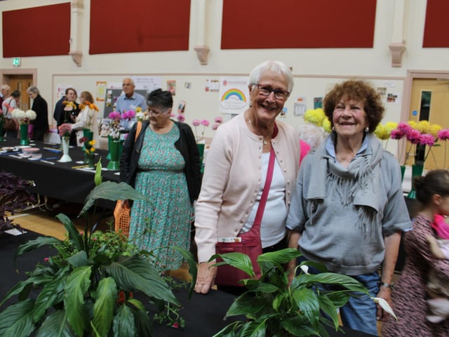 Edna Cromie and May Waugh admiring the flowers at the show