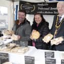 Tony and Kay from Tony’s Griddled Goods alongside Mayor, Councillor Steven Callaghan at Causeway Speciality Market, which has been named the UK’s Best Small Outdoor Market 2024. Pic: McAuley Multimedia